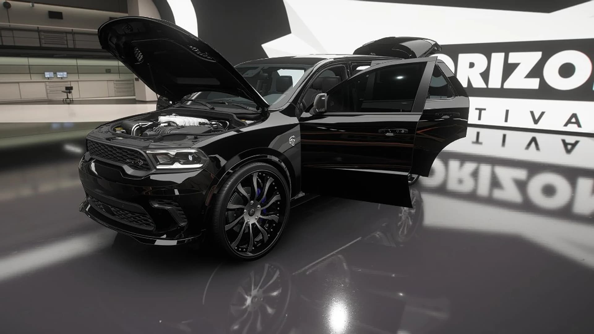 Black Dodge Durango SRT Hellcat with open doors, hood, and liftgate — Xvision showcase