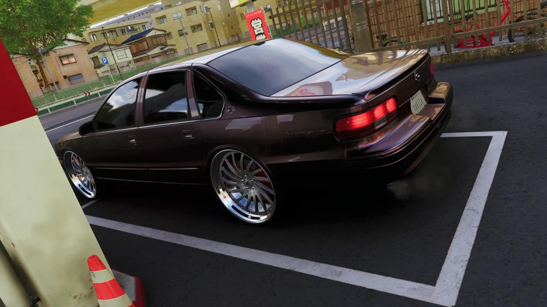 Slammed Impala SS with deep-dish chrome wheels — Xvision showcase